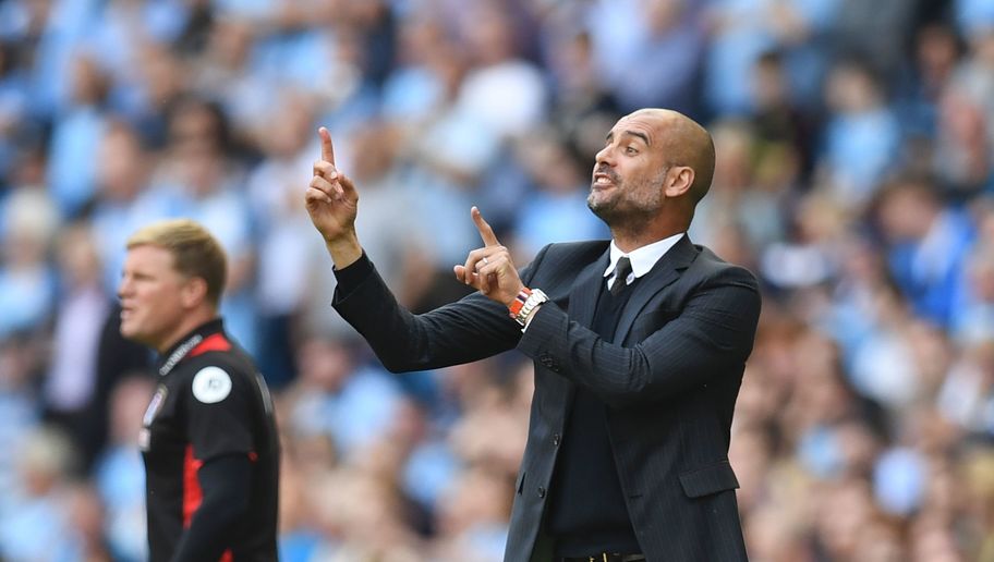 Manchester City's Spanish manager Pep Guardiola (R) gestures on the touchline next to Bournemouth's English manager Eddie Howe (L) during the English Premier League football match between Manchester City and Bournemouth at the Etihad Stadium in Manchester, north west England, on September 17, 2016. / AFP / PAUL ELLIS / RESTRICTED TO EDITORIAL USE. No use with unauthorized audio, video, data, fixture lists, club/league logos or 'live' services. Online in-match use limited to 75 images, no video emulation. No use in betting, games or single club/league/player publications. / (Photo credit should read PAUL ELLIS/AFP/Getty Images)
